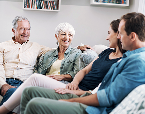 Older couple discussing dialysis therapy options with their adult children