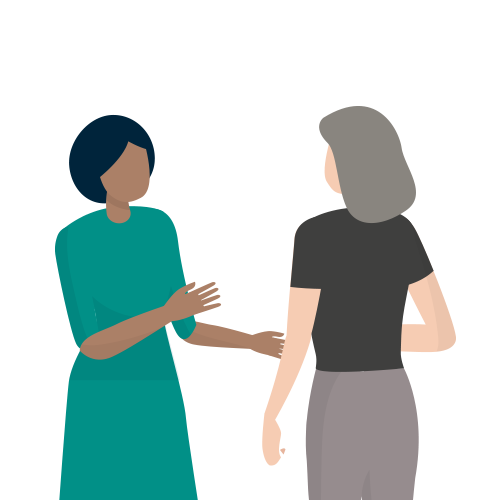 Two women talking to each other with one sharing information about their condition